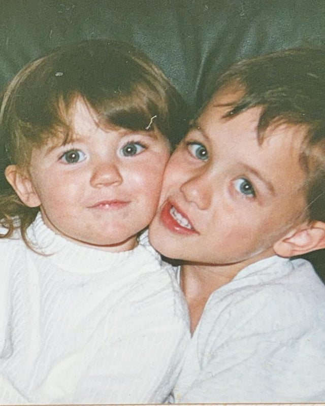 Childhood photo of AEVUM co-founders Niamh and Luke McCormack as young siblings